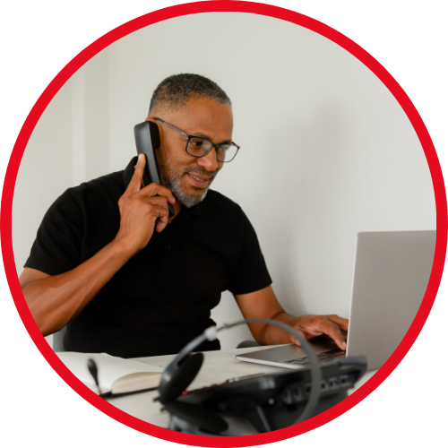 A man making a national call on a VoIP line.