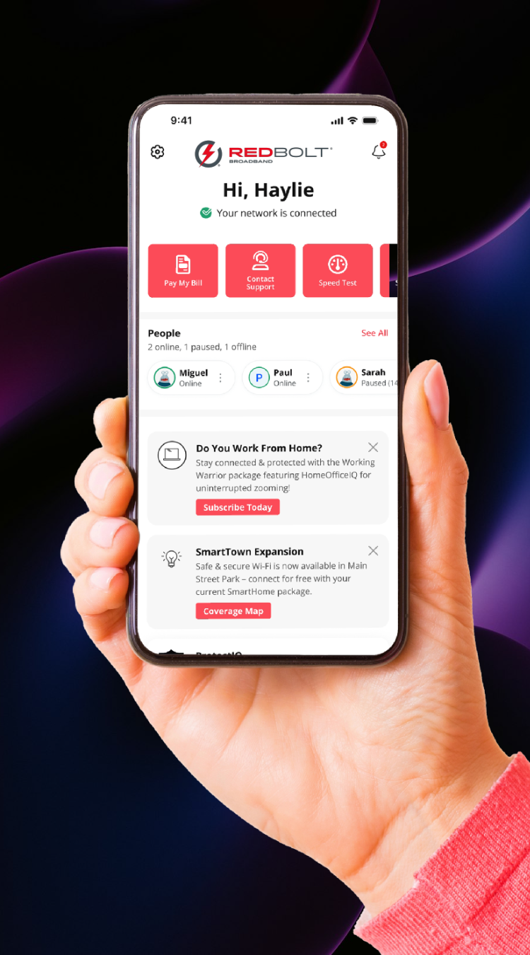 Hand holding phone that displays CommandIQ page
