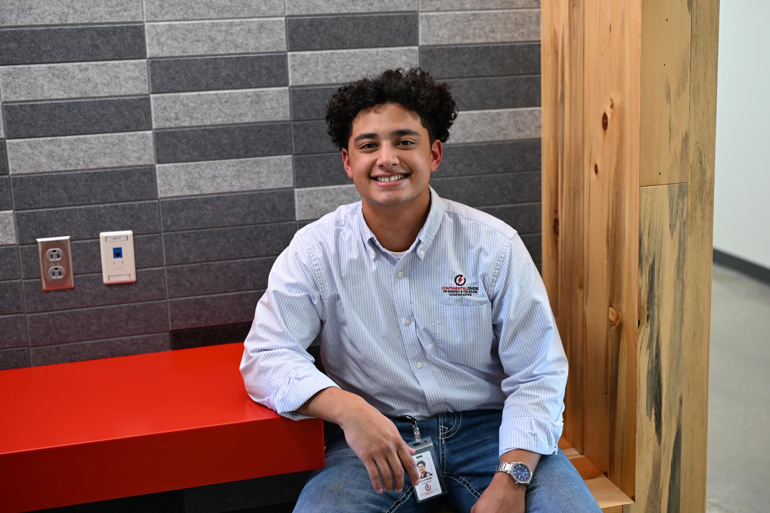 Employee Terrell Hocker sitting and smiling