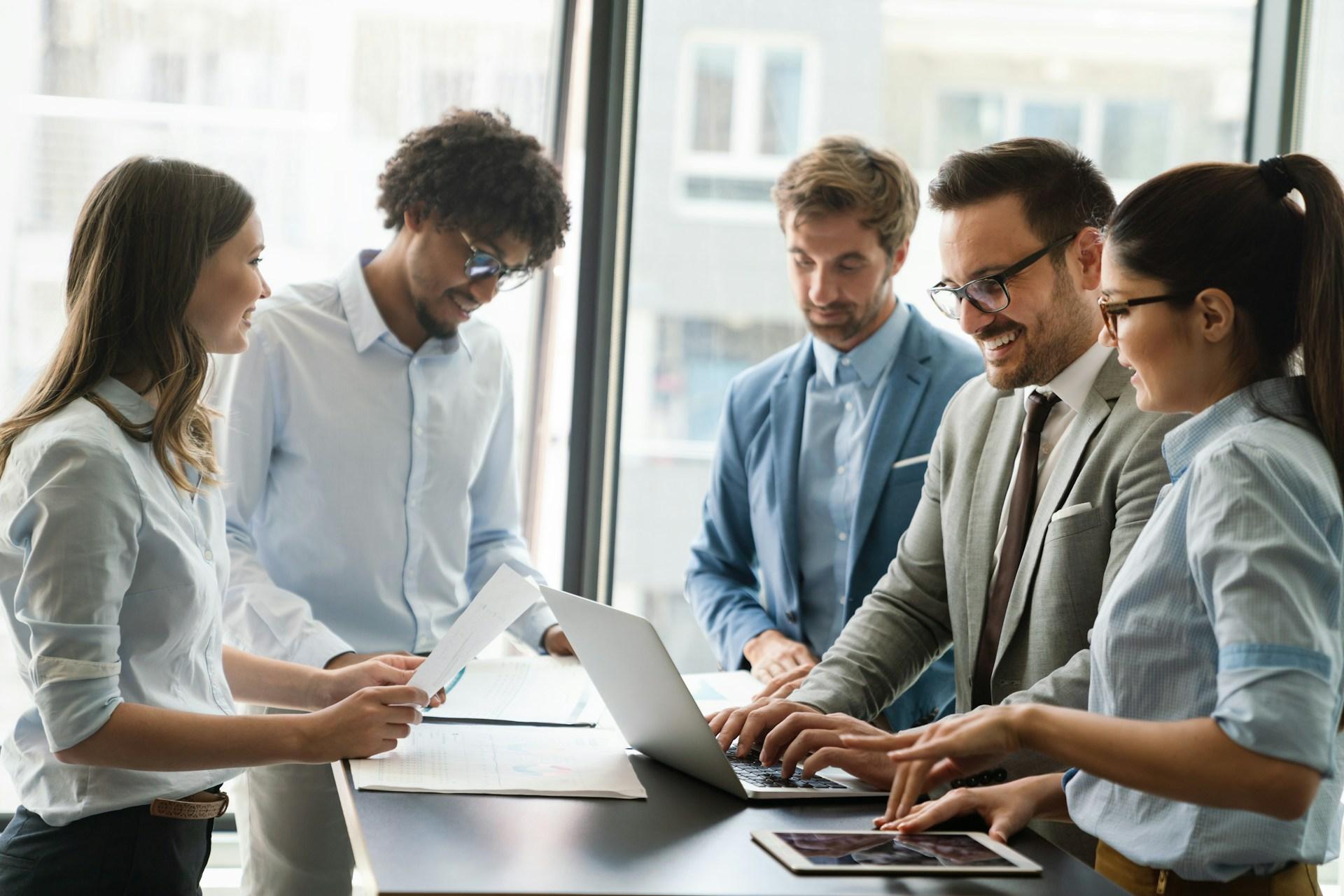 people talking in an office